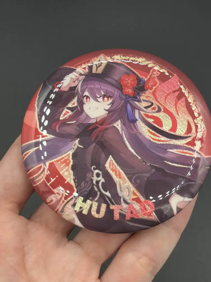 Hutao Genshin Impact Anime Badge – Held in Hand, Showing Size and Detail | The Void Vault