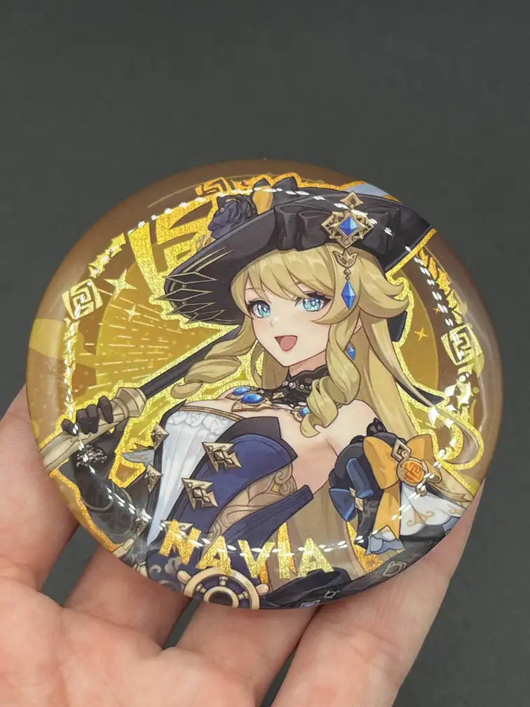Navia Genshin Impact Anime Badge – Held in Hand, Showing Size and Detail | The Void Vault