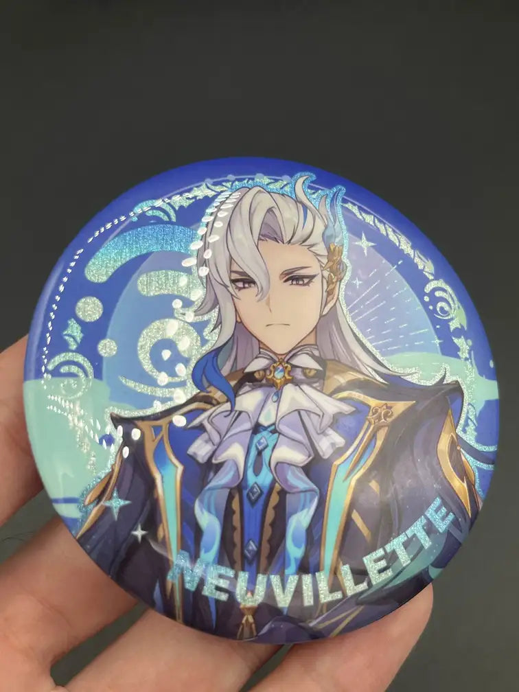 Neuvillette Genshin Impact Anime Badge – Held in Hand, Showing Size and Detail | The Void Vault