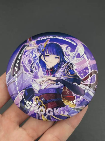Raiden Shogun Genshin Impact Anime Badge – Held in Hand, Showing Size and Detail | The Void Vault